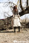 Astonishing brunette in stockings posing seductively outdoors - Photo #17