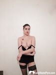 Beautiful college girl teasing in black stockings - Photo #3