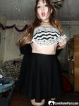 Perfect Asian sweetie removes her sexy skirt - Photo #3
