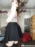 Perfect Asian sweetie removes her sexy skirt - Photo #5