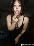 Perfect Asian sweetie removes her sexy skirt - Photo #19