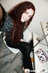 Beautiful redhead babe posing around her apartment - Photo #5