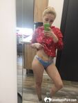 Lusty teen showing her tits in socks - Photo #9