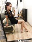 Kinky brunette taking pics while stripping her clothes - Photo #7