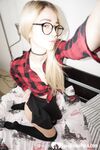 Naughty nerdy schoolgirl strips off her uniform - Photo #1