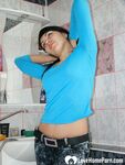 Hot neighbor shows off her body before bathing - Photo #7