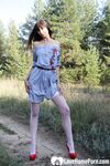 Amateur mom in stockings fools around in dirt - Photo #8