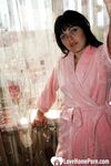 Brunette removes her bathrobe to reveal everything - Photo #5