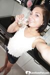 Brunette wears white gloves while showing her boobs - Photo #8