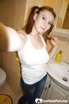 Brunette teen teases with her juicy ass - Photo #10