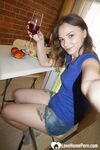 Smoking teen posing in a sexy schoolgirl outfit - Photo #10