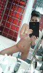 Beautiful tattooed babe teasing in black stockings - Photo #5