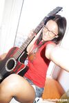 Naughty guitarist shows off her good bits - Photo #3