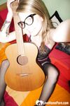 Cute nerdy guitarist posing in some lingerie - Photo #6