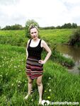 Sensational beauty being naked in the grass - Photo #1