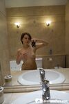 Hot mom loves posing for the mirror - Photo #3