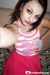 Beautiful babe with red lipstick showing her tatas - Photo #8