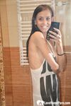 Skinny babe teases with her small tits - Photo #1