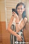 Skinny babe teases with her small tits - Photo #2