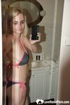 Blonde strips off her bikini for a nude - Photo #3