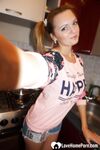 Cutie loves to flash her natural boobs - Photo #8