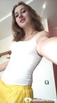 Desirable brunette teases with her hairy slit - Photo #10