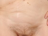 Skinny granny Cassie strips naked and spreads her hairy cunt up close - Photo #8