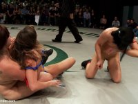 Muscular lesbian women wrestle in bikinis during a tag team match - Photo #19