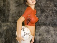 Young Asian girl with a great tits models naked covered in bodypaint - Photo #5