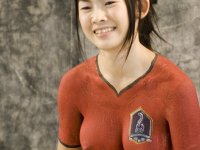 Young Asian girl with a great tits models naked covered in bodypaint - Photo #16