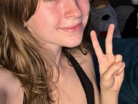 Sweet teen with a gap in her front teeth shows her underwear on a bed - Photo #7