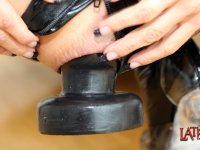 Dark-haired woman inserts a huge butt plug before having her asshole spread - Photo #8