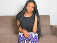 Ebony first timer uncovers her big natural boobs as she strips naked - Photo #1