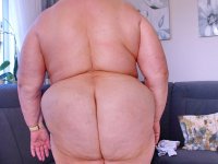 Chubby granny Marie Theres shows her big saggy tits & ass while changing - Photo #17