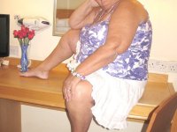Fat British nan Grandma Libby completely disrobes while in a hotel room - Photo #3