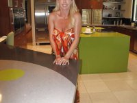 Adorable MILF with big tits and slender legs Wifey posing topless - Photo #2