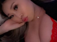 Gorgeous Asian solo girl with large boobs sticks out her tongue - Photo #11