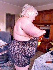Chubby granny Marie Theres shows her big saggy tits & ass while changing