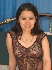Latina cutie showcases her pussy after playing with her exposed nipples