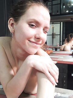 Taking naughty selfies with a couple of oranges
