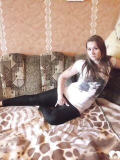 Smoking brunette girlfriend does some arrousing teasing