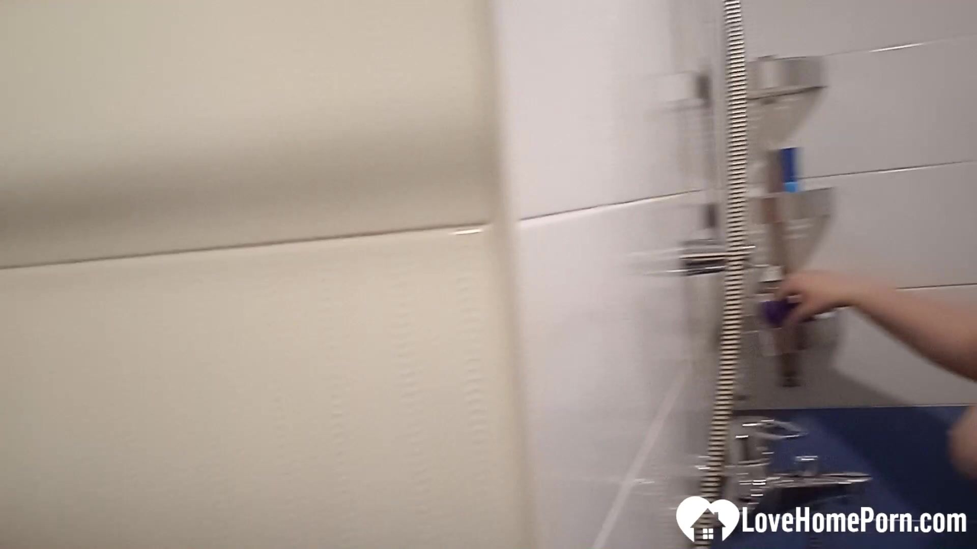 Tattooed redhead touches herself in the bathroom